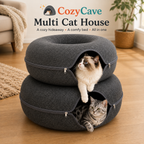 Cozy Cave Multi Cat House with two cats inside on a wooden floor.