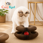 Cat playing with a Cozy Kurl cat toy in a home setting